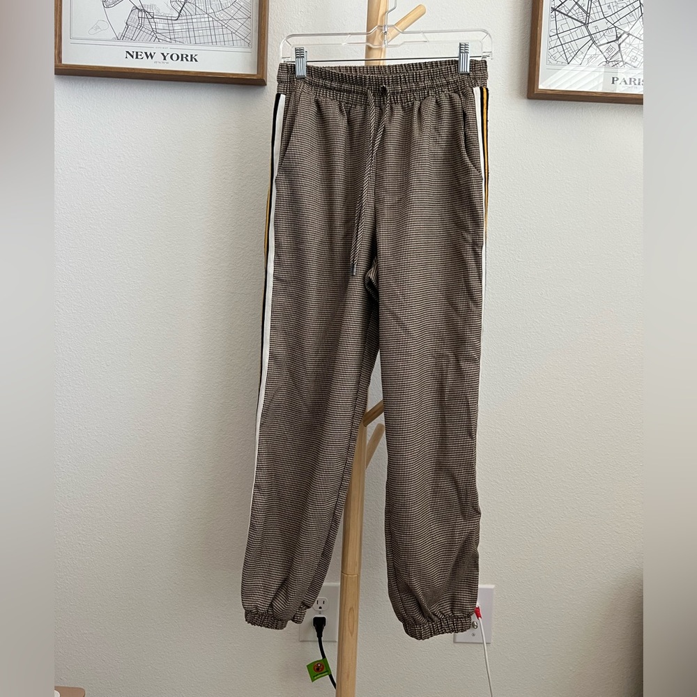 Houndstooth, stripped joggers.